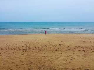 Cavendish Beach person Cavendish Beach person walking towards water